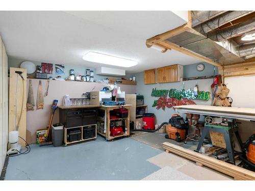 8 Shawnee Way Sw, Calgary, AB - Indoor Photo Showing Basement