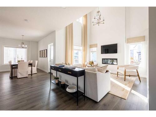 9 Fieldstone Link, Balzac, AB - Indoor Photo Showing Living Room With Fireplace