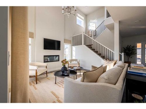 9 Fieldstone Link, Balzac, AB - Indoor Photo Showing Living Room With Fireplace