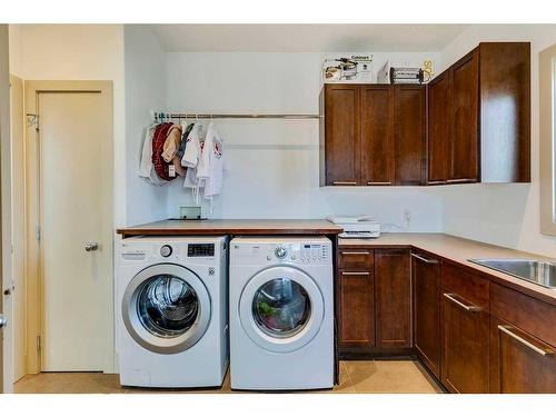 48 Amiens Crescent Sw, Calgary, AB - Indoor Photo Showing Laundry Room