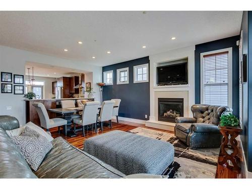 48 Amiens Crescent Sw, Calgary, AB - Indoor Photo Showing Living Room With Fireplace