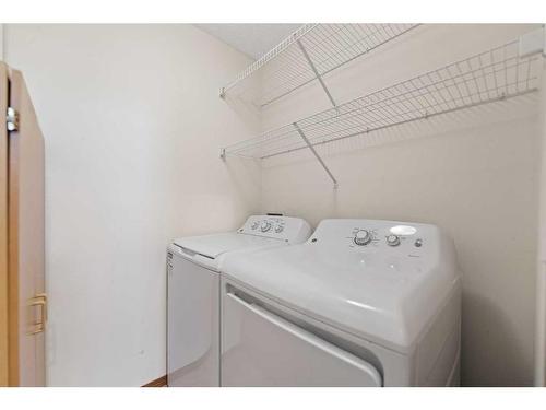 6 Douglasview Park Se, Calgary, AB - Indoor Photo Showing Laundry Room