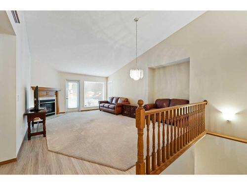 6 Douglasview Park Se, Calgary, AB - Indoor Photo Showing Other Room With Fireplace