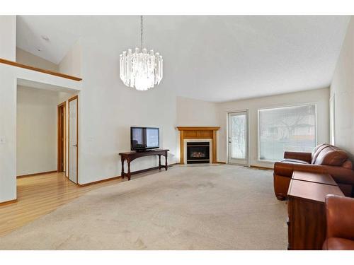 6 Douglasview Park Se, Calgary, AB - Indoor Photo Showing Living Room With Fireplace