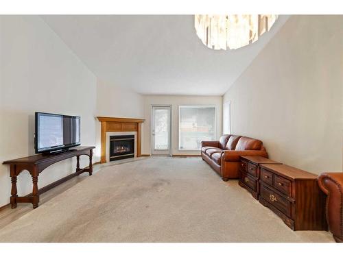 6 Douglasview Park Se, Calgary, AB - Indoor Photo Showing Other Room With Fireplace