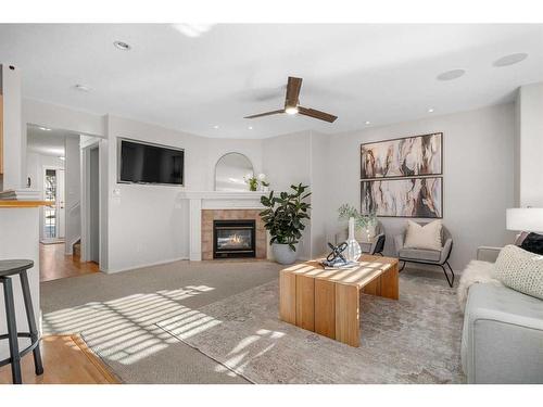 267 Coventry Court Ne, Calgary, AB - Indoor Photo Showing Living Room With Fireplace