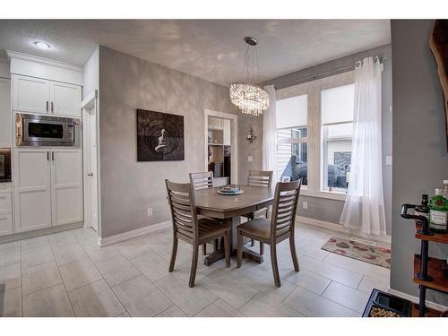 1186 Coopers Drive Sw, Airdrie, AB - Indoor Photo Showing Dining Room