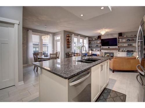 1186 Coopers Drive Sw, Airdrie, AB - Indoor Photo Showing Kitchen With Double Sink