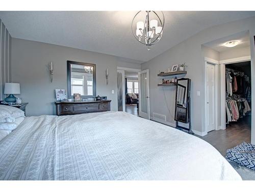 1186 Coopers Drive Sw, Airdrie, AB - Indoor Photo Showing Bedroom