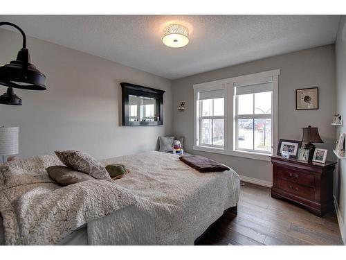 1186 Coopers Drive Sw, Airdrie, AB - Indoor Photo Showing Bedroom