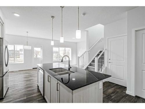 17 Creekstone Place Sw, Calgary, AB - Indoor Photo Showing Kitchen With Double Sink With Upgraded Kitchen