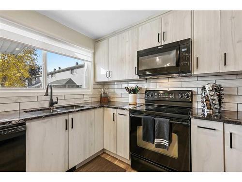 362 Killarney Glen Court Sw, Calgary, AB - Indoor Photo Showing Kitchen With Double Sink