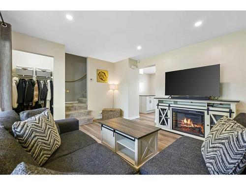 362 Killarney Glen Court Sw, Calgary, AB - Indoor Photo Showing Living Room With Fireplace