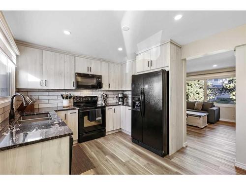 362 Killarney Glen Court Sw, Calgary, AB - Indoor Photo Showing Kitchen With Double Sink