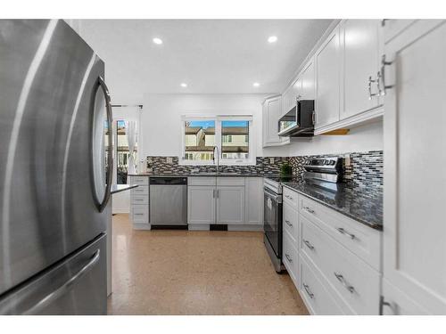 65-1012 Ranchlands Boulevard Nw, Calgary, AB - Indoor Photo Showing Kitchen With Upgraded Kitchen