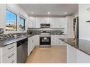 65-1012 Ranchlands Boulevard Nw, Calgary, AB  - Indoor Photo Showing Kitchen With Upgraded Kitchen 