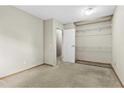 118-6915 Ranchview Drive Nw, Calgary, AB - Indoor Photo Showing Other Room