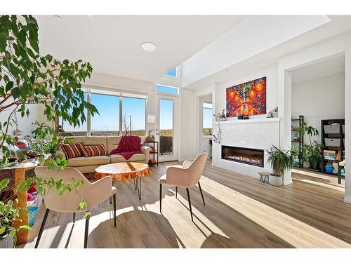 120 Howse Crescent Ne, Calgary, AB - Indoor Photo Showing Living Room With Fireplace