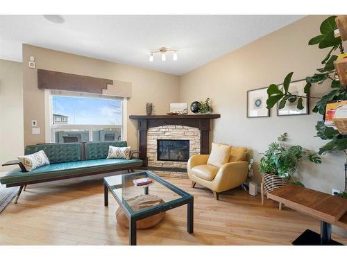 111 Sage Hill Green Nw, Calgary, AB - Indoor Photo Showing Living Room With Fireplace