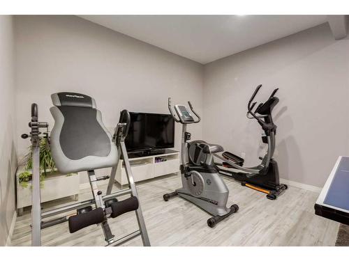 102 Hillcrest Heights Sw, Airdrie, AB - Indoor Photo Showing Gym Room