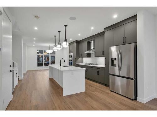 7106 36 Avenue Nw, Calgary, AB - Indoor Photo Showing Kitchen With Stainless Steel Kitchen With Upgraded Kitchen