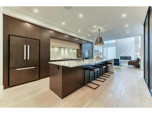 105 Trasimeno Crescent Sw, Calgary, AB - Indoor Photo Showing Kitchen With Upgraded Kitchen