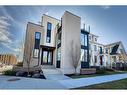 105 Trasimeno Crescent Sw, Calgary, AB  - Outdoor With Facade 