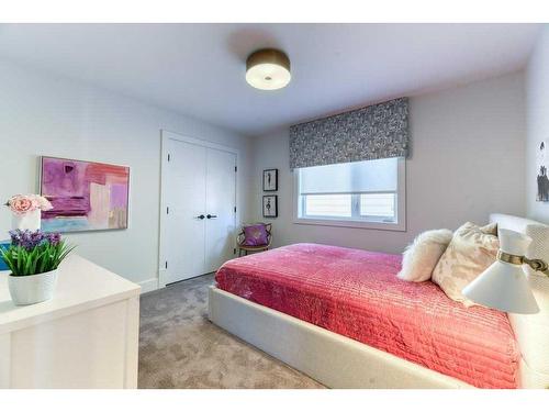 105 Trasimeno Crescent Sw, Calgary, AB - Indoor Photo Showing Bedroom