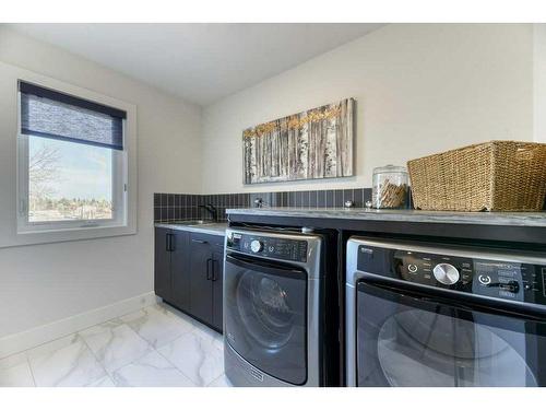 105 Trasimeno Crescent Sw, Calgary, AB - Indoor Photo Showing Laundry Room