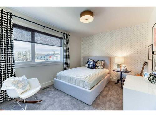 105 Trasimeno Crescent Sw, Calgary, AB - Indoor Photo Showing Bedroom