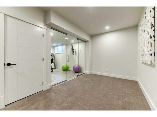 105 Trasimeno Crescent Sw, Calgary, AB - Indoor Photo Showing Other Room