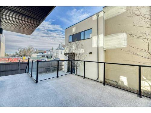 105 Trasimeno Crescent Sw, Calgary, AB - Outdoor With Balcony With Exterior