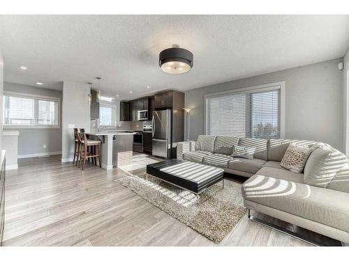 105 Trasimeno Crescent Sw, Calgary, AB - Indoor Photo Showing Living Room