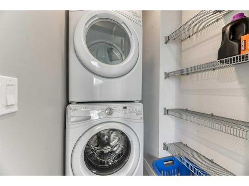 105 Trasimeno Crescent Sw, Calgary, AB - Indoor Photo Showing Laundry Room