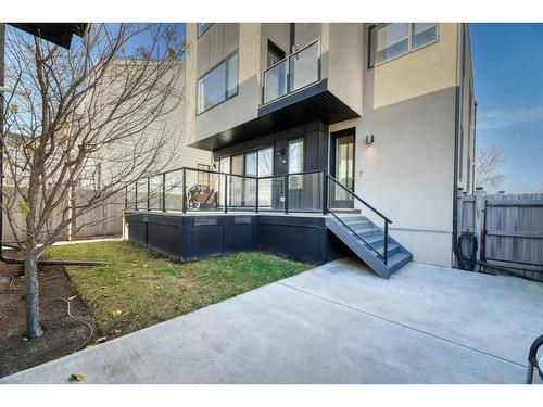 105 Trasimeno Crescent Sw, Calgary, AB - Outdoor With Balcony With Deck Patio Veranda With Exterior