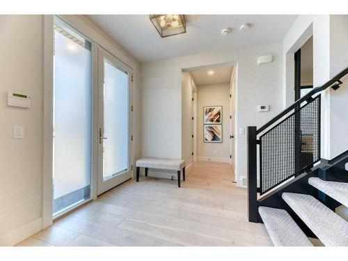 105 Trasimeno Crescent Sw, Calgary, AB - Indoor Photo Showing Other Room