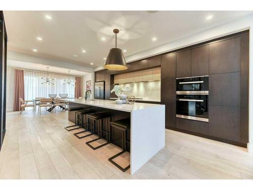 105 Trasimeno Crescent Sw, Calgary, AB - Indoor Photo Showing Kitchen With Upgraded Kitchen