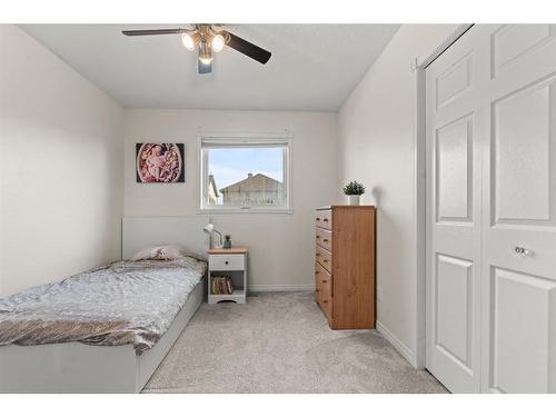 50 Crystalridge Crescent, Okotoks, AB - Indoor Photo Showing Bedroom