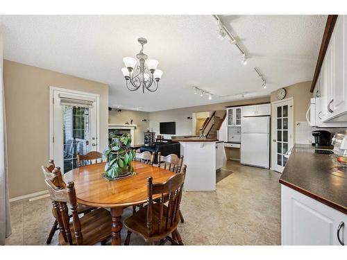 396 Rocky Ridge Drive Nw, Calgary, AB - Indoor Photo Showing Dining Room