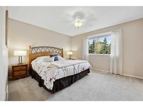 396 Rocky Ridge Drive Nw, Calgary, AB - Indoor Photo Showing Bedroom