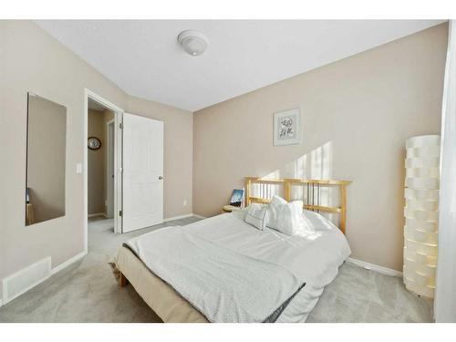 396 Rocky Ridge Drive Nw, Calgary, AB - Indoor Photo Showing Bedroom