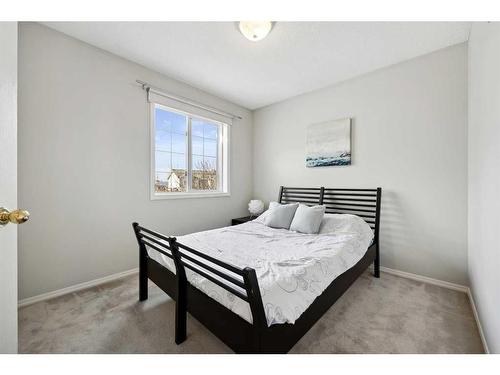 396 Rocky Ridge Drive Nw, Calgary, AB - Indoor Photo Showing Bedroom