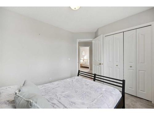 396 Rocky Ridge Drive Nw, Calgary, AB - Indoor Photo Showing Bedroom