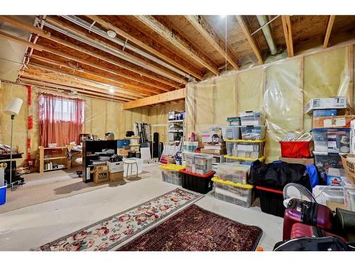 396 Rocky Ridge Drive Nw, Calgary, AB - Indoor Photo Showing Basement