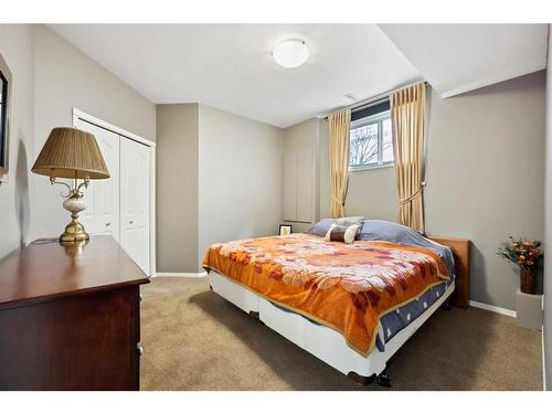 396 Rocky Ridge Drive Nw, Calgary, AB - Indoor Photo Showing Bedroom