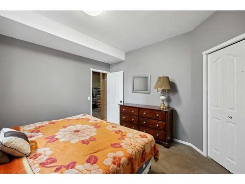 396 Rocky Ridge Drive Nw, Calgary, AB - Indoor Photo Showing Bedroom