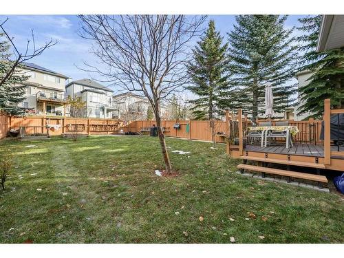 396 Rocky Ridge Drive Nw, Calgary, AB - Outdoor With Deck Patio Veranda With Backyard