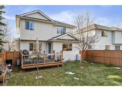 396 Rocky Ridge Drive Nw, Calgary, AB - Outdoor With Deck Patio Veranda