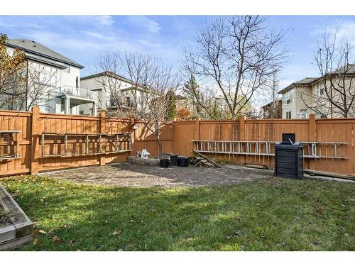 396 Rocky Ridge Drive Nw, Calgary, AB - Outdoor With Backyard