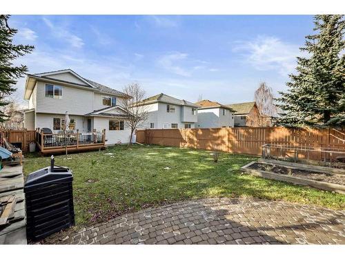 396 Rocky Ridge Drive Nw, Calgary, AB - Outdoor With Deck Patio Veranda With Backyard With Exterior